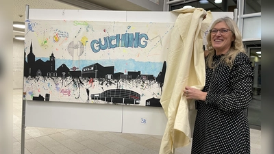 Jetzt hat auch Gilching seine Skyline. Karin Gredinger enthüllt ihr Überraschungsbild im Rathaus Gilching. (Foto: pst)