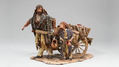 Die Krippensammlung im Bayerischen Nationalmuseum ist heuer erweitert um eine zeitgenössische Krippe von Angela Tripi, der derzeit international bekanntesten italienischen Krippenkünstlerin. Im Bild ein Karrenschieber mit Kind.  (Foto: Bayerisches Nat.mus. Bastian Krack)