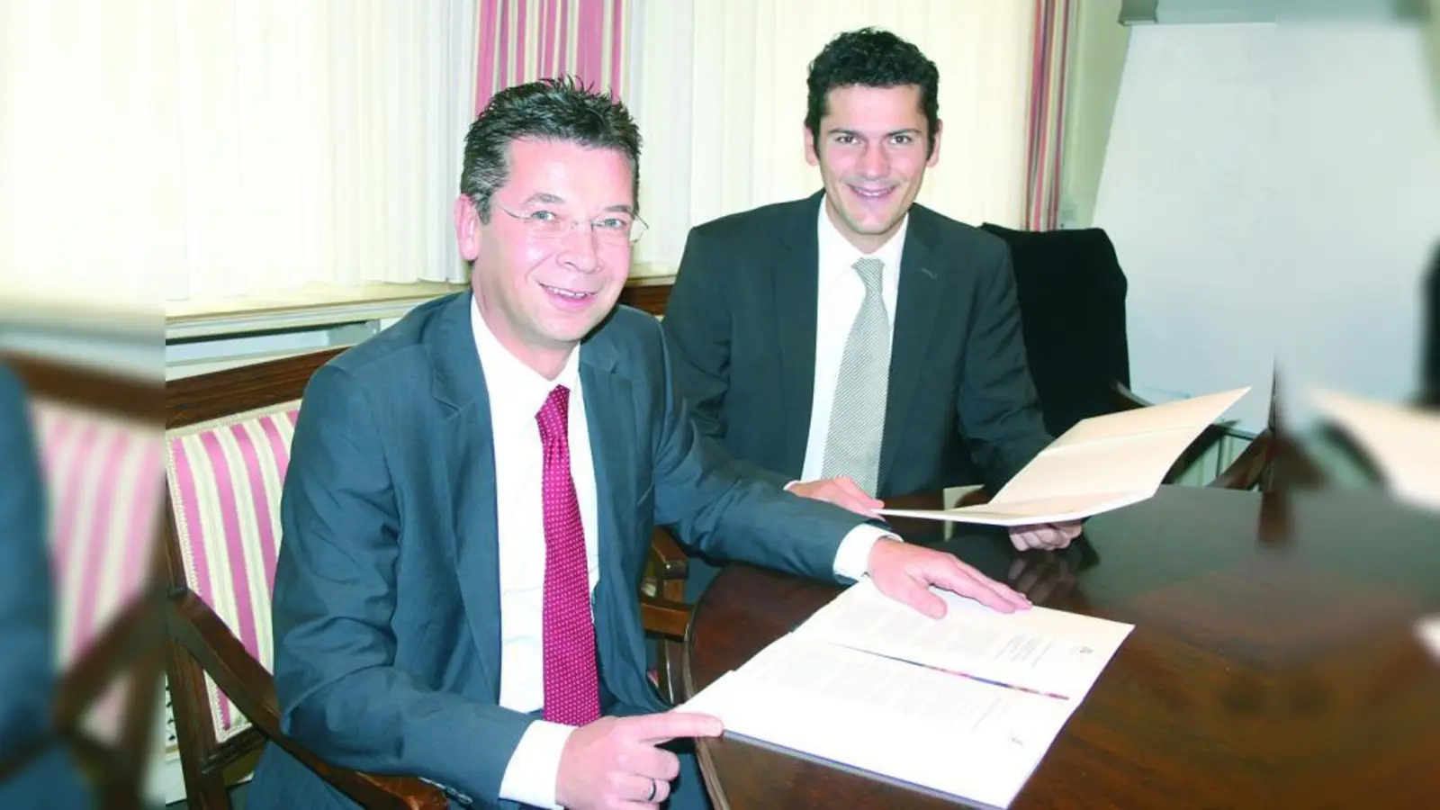 Sie freuen sich über das gute Münchner Ergebnis: Die dm-Gebietsverantwortlichen Michael Winker (l.) und Rolf Posch. (Foto: bb)