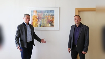 C. Böck (l.) und M. Böck (r.) trafen sich im Unterschleißheimer Rathaus (Foto: VA)