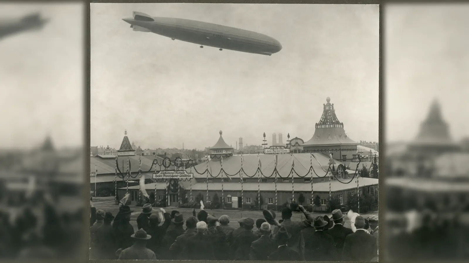 Spektakulärer Anblick: Am 1. Oktober 1929 fuhr das Luftschiff LZ 127 „Graf Zeppelin” über die Oktoberfestwiese. Die „Graf Zeppelin” hatte in den beiden Monaten zuvor den Erdball umrundet und innerhalb von 35 Tagen 49.618 km zurückgelegt. Von 1931 bis 1937 pendelte sie regelmäßig zwischen Deutschland und Brasilien über den Atlantik. (Foto: Stadtarchiv München DE-1992-FS-ERG-B-2255)