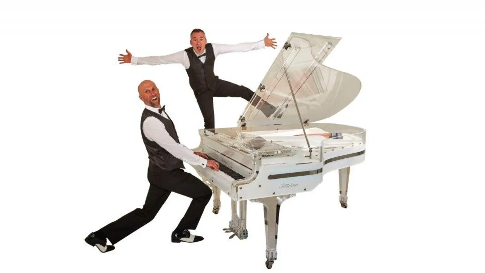 Laden ein zur „Kla4händigen Weltreise Show”: Stephan Weh (links) und Marcel Dorn. (Foto: Pianotainment)