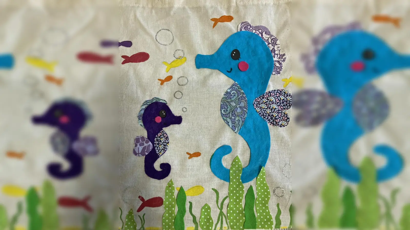 In der Atelierwerkstatt können die Besucher aus bunten, gemusterten Stoffen kleine Seepferdchen, Glitzerfische oder Clownsfische gestalten und damit einfache Baumwolltaschen verschönern. (Foto: Feierwerk)